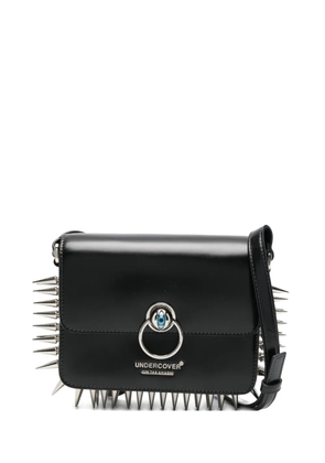 Undercover studded ring-detail shoulder bag - Black