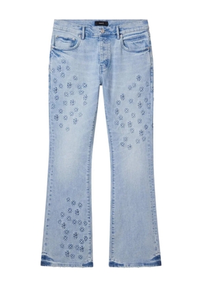 Purple Brand monogram-embossed flared jeans - Blue
