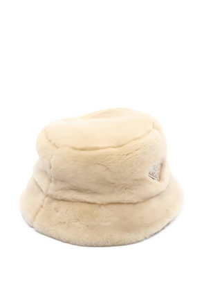 Prada Pre-Owned 2010s logo-plaque fur bucket hat - Neutrals