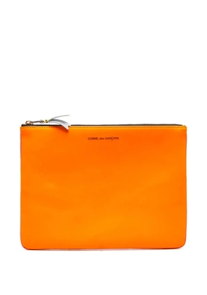 Comme Des Garçons Wallet logo-print clutch bag - Pink