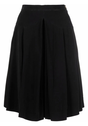 CHANEL Pre-Owned 1990s CC button pleated skirt - Black