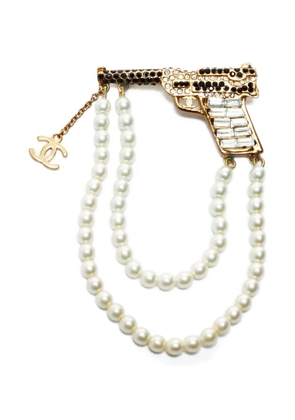 CHANEL Pre-Owned 2001 pistol-motif brooch - Gold