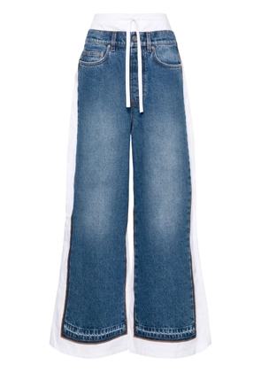 Jean Paul Gaultier Trompe L'oeil denim-panels trousers - Blue