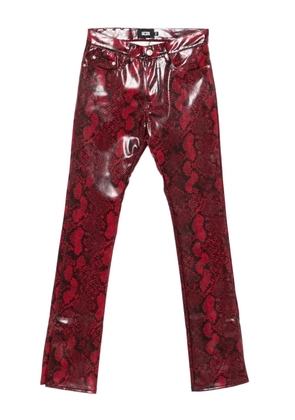 GCDS snakeskin-print pants - Red