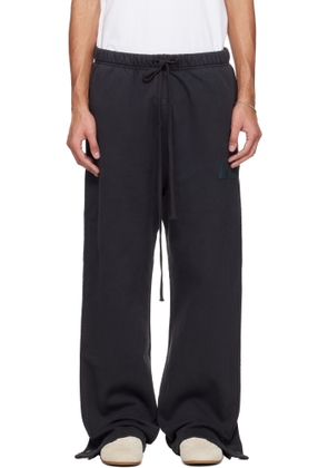 Fear of God ESSENTIALS Black Holiday Heavy Fleece Tearaway Sweatpants
