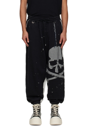MASTERMIND WORLD Black Cut-Off Sweatpants