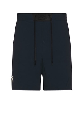On Performance Hybrid Short in Navy - Navy. Size L (also in M, S, XL/1X).