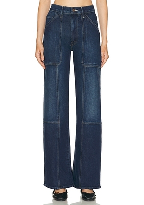 MOTHER The Lasso Utility Sneak Jeans in Shine On - Blue. Size 23 (also in 24, 25, 26, 27, 28, 29, 30, 31, 32, 33, 34).