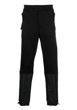 Alexander McQueen panelled tapered track pants - Black