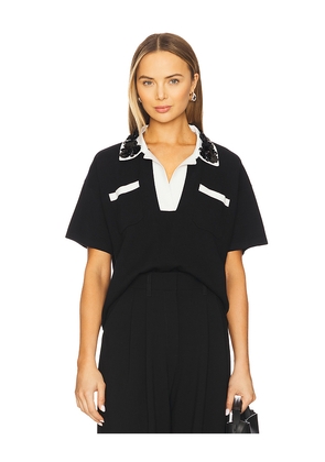 Essentiel Antwerp Hoiseau Polo in Black. Size M. Also in S.