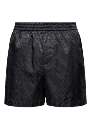 Alexander McQueen skull-patterned shorts - Black