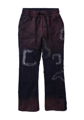Who Decides War patchwork track pants - Black