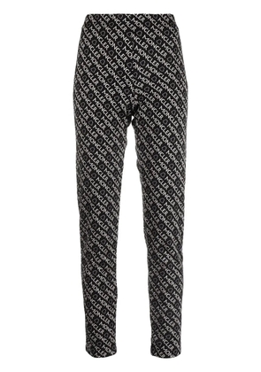 Moncler logo-print jersey trousers - Black