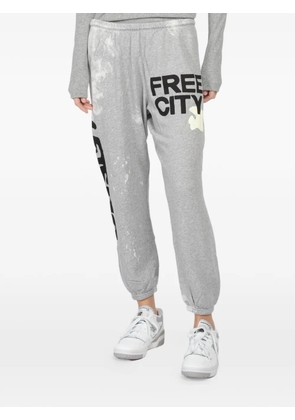 FreeCity bleachout graphic track pants - Grey