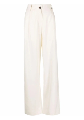 Studio Nicholson high waisted straight leg trousers - Neutrals