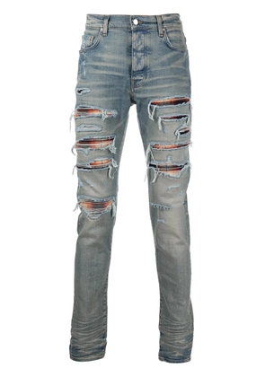 AMIRI distressed skinny jeans - Blue