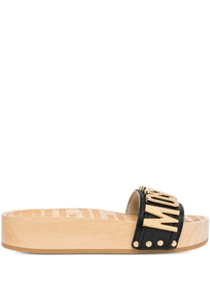 Moschino logo-lettering mules - Black