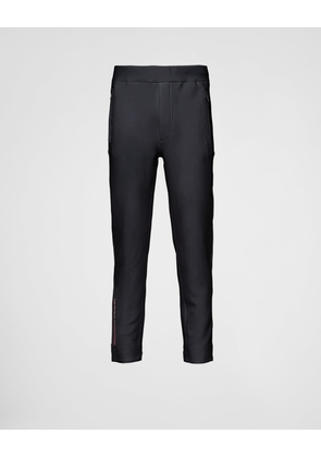 Technical fabric joggers with heat-sealed taped seams
