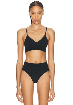 LDMA Low Show V Bralette in Black - Black. Size L (also in M, S).