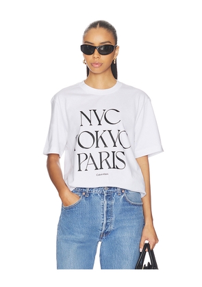 Calvin Klein Flagship City Tee in White. Size L. Also in M, S, XL/1X.