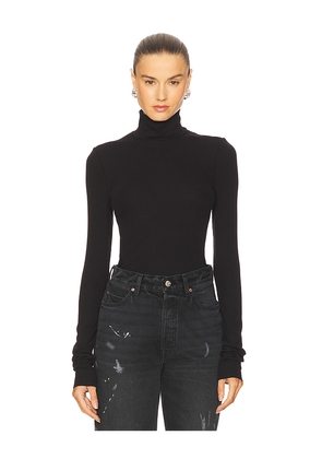 GRLFRND Essential Long Sleeve Turtleneck in Black. Size L. Also in S, XL.