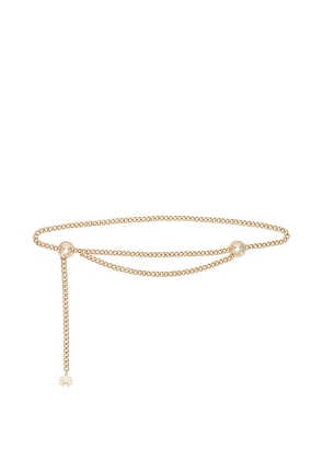 Lele Sadoughi Logo Chain Belt in Metallic Gold.