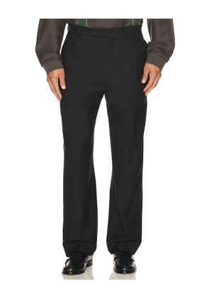 Palmes Wool Pleated Trousers in Black. Size 50. Also in 52.