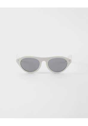 Prada sunglasses with the iconic metal plaque
