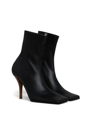 ALAÏA Leather Ankle Boots - Moda Operandi