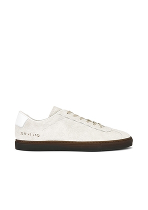 Common Projects Article 2517 Field Trainer Sneaker in Off White - White. Size 43 (also in ).