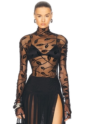 Norma Kamali Long Sleeve Turtleneck Top in Black Leaf - Black. Size S (also in ).