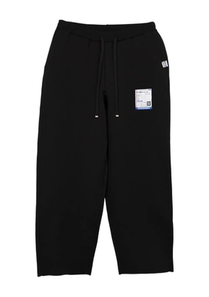 in･stru(men-tal). Milan rib-knit drawstring trousers - Black
