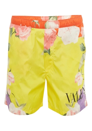Valentino Pre-Owned flower-print side-pocket trousers - Yellow