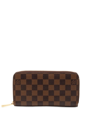 Louis Vuitton Pre-Owned 2012 Damier Ebene Zippy Wallet long wallets - Brown