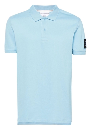 Calvin Klein Jeans logo-patch piqué polo shirt - Blue