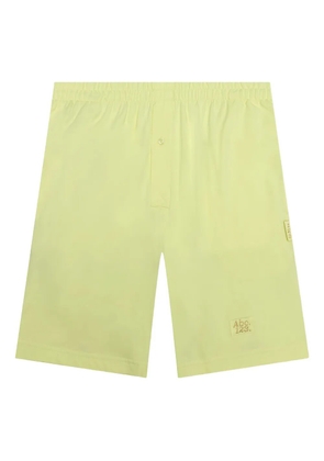 Advisory Board Crystals logo-patch elasticated-waist shorts - Yellow