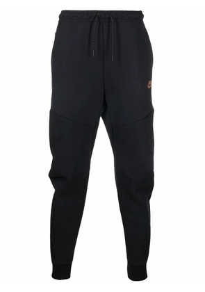 Nike logo-print drawstring-waist track pants - 010 BLACK