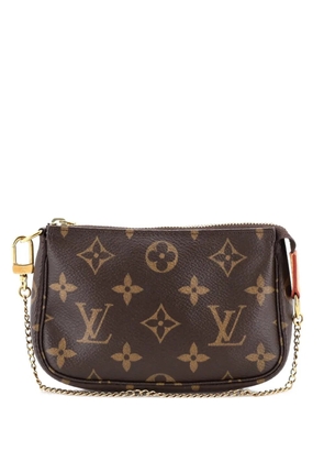Louis Vuitton Pre-Owned Pochette Accessoires Monogram Canvas Mini clutch bag - Brown