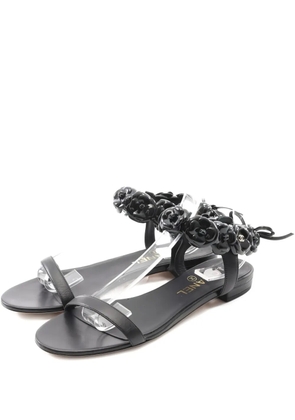 CHANEL Pre-Owned camillia-embellished flat sandals - Black