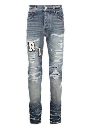 AMIRI Varsity ripped skinny jeans - Blue