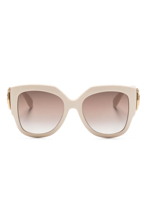 Gucci Eyewear logo-plaque round-frame sunglasses - Neutrals