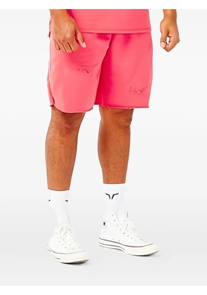 SQUATWOLF Golden Era ripped shorts - Pink