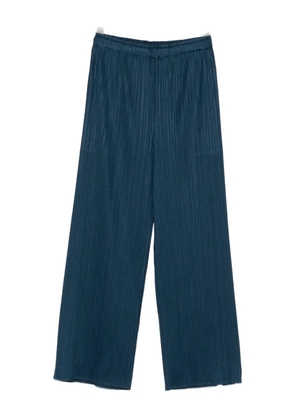 Issey Miyake plissé-effect trousers - Blue