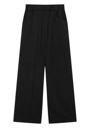 izzue logo-patch trousers - Black