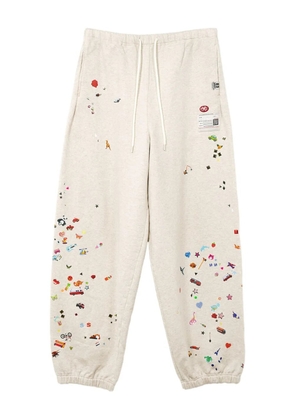 Maison MIHARA YASUHIRO Sticker graphic-print track pants - White