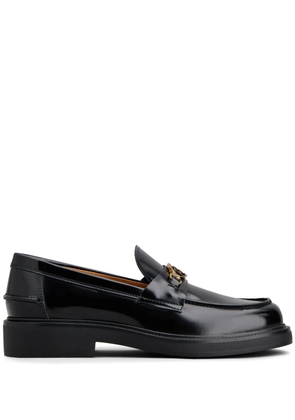 Tod's logo-plaque leather loafers - Black