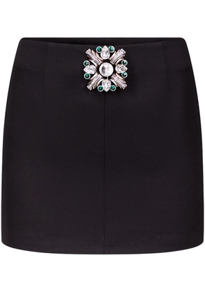 AREA brooch-detail mini skirt - Black