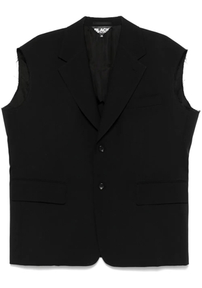 Black Comme Des Garçons sleeveless blazer