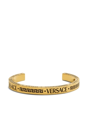 Versace engraved-logo cuff bracelet - Gold