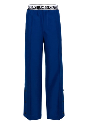 Versace Jeans Couture logo-waistband wide-leg trousers - Blue